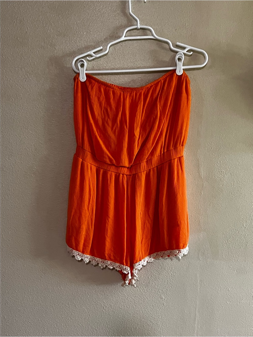 Charlotte Russe Bright Orange Strapless Romper with Crochet Hem
